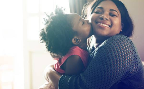 Mother Hugging Daughter