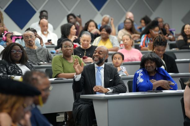 representative harold love waving