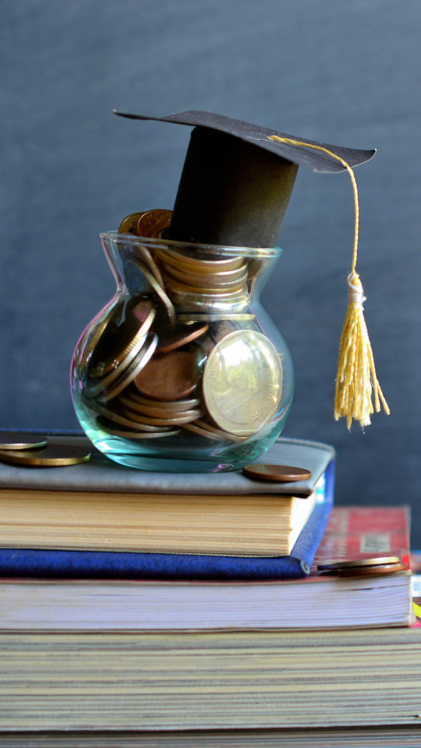 jar of change with graduate cap